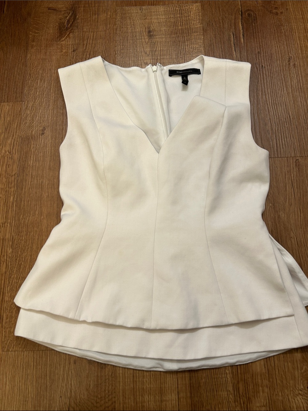 BCBGMaxAzria White Peplum V-Neck Sleeveless Top